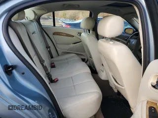 2005 Jaguar S-Type z VIN SAJWA01T45FN51425, wystawiony jako Copart lot #86682684 z przebiegiem 53 218 mil mil oraz Czysty tytuł • Clean title. Historia ofert i sprzedaży dostępna na DreamBid. Obrazek 10.