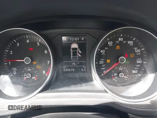 2016 Volkswagen Passat SE z VIN 1VWBT7A38GC009794, wystawiony jako IAAI lot #42246060 z przebiegiem 126 678 mil mil oraz . Historia ofert i sprzedaży dostępna na DreamBid. Obrazek 7.
