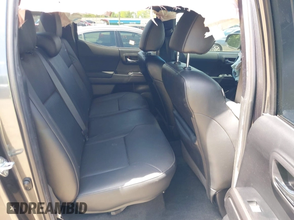 2023 Toyota Tacoma SR with VIN 3TMCZ5AN9PM553246, listed as a IAAI auction lot 42201812 with 20,907 mi miles and . Bid and sale history available at DreamBid. Image 8.