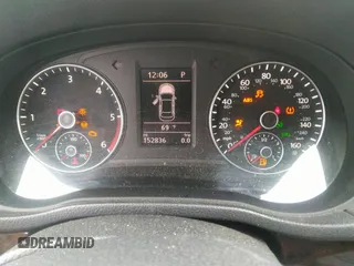 2014 Volkswagen Passat SEL Premium z VIN 1VWCN7A32EC061384, wystawiony jako IAAI lot #42210170 z przebiegiem 152 836 mil mil oraz . Historia ofert i sprzedaży dostępna na DreamBid. Obrazek 7.