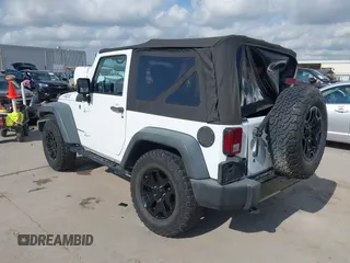2015 Jeep Wrangler Willys Wheeler with VIN 1C4AJWAG0FL562536, listed as a IAAI auction lot 42384747 with 103,507 mi miles and . Bid and sale history available at DreamBid. Image 3.