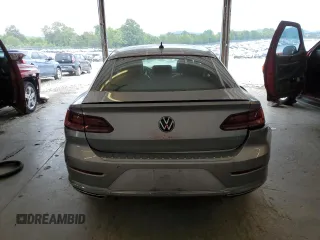 2021 Volkswagen Arteon SEL R-Line с VIN WVWHR7ANXME004450, выставлен на аукционе Copart как лот 62593443 с пробегом 8 900 миль миль и . История ставок и продаж доступна на DreamBid. Изображение 6.