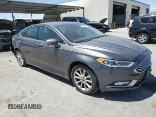 2017 Ford Fusion SE with VIN 3FA6P0HD5HR123694, listed as a Copart auction lot 54836325 with 127,447 mi miles and Salvage title. Bid and sale history available at DreamBid. Image 4.