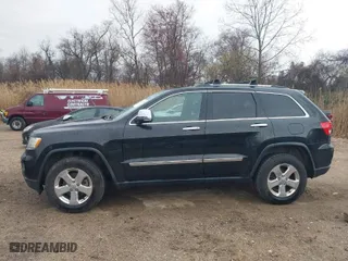 2013 Jeep Grand Cherokee Limited with VIN 1C4RJFBG0DC656382, listed as a IAAI auction lot 41870162 with 162,869 mi miles. Bid and sale history available at carsss.com. Image 14.