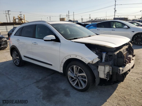 2017 Kia Niro Touring with VIN KNDCE3LC2H5079191, listed as a Copart auction lot 50053415 with 123,138 mi miles and Salvage Title. Bid and sale history available at carsss.com. Image 4.