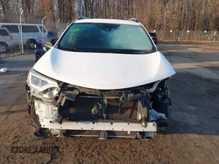 2017 Toyota RAV4 LE with VIN JTMZFREV7HJ120317, listed as a IAAI auction lot 41166489 with 144,799 mi miles and . Bid and sale history available at carsss.com. Image 13.