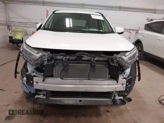 2023 Toyota RAV4 Hybrid XLE with VIN JTMRWRFV1PD180055, listed as a IAAI auction lot 41748593 with 40,487 mi miles. Bid and sale history available at carsss.com. Image 12.