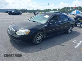 2009 Buick Lucerne CXL with VIN 1G4HD57MX9U127160, listed as a IAAI auction lot 42222588 with 219,611 mi miles and . Bid and sale history available at DreamBid. Image 2.