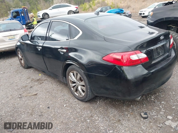 2012 Infiniti M with VIN JN1BY1AP5CM333975, listed as a IAAI auction lot 41701701 with 130,828 mi miles and . Bid and sale history available at DreamBid. Image 3.