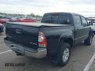 2013 Toyota Tacoma z VIN 3TMLU4EN5DM107819, wystawiony jako IAAI lot #42167593 z przebiegiem 196 714 mil mil oraz . Historia ofert i sprzedaży dostępna na DreamBid. Obrazek 4.