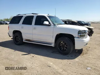 2003 GMC Yukon Denali z VIN 1GKEK63U53J210632, wystawiony jako Copart lot #56098925 z przebiegiem 258 313 mil mil oraz Szkoda całkowita • Salvage title. Historia ofert i sprzedaży dostępna na DreamBid. Obrazek 4.