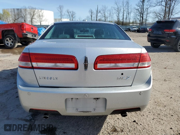 2010 Lincoln MKZ с VIN 3LNHL2GC7AR601053, выставлен на аукционе Copart как лот 54455795 с пробегом 176 451 миль миль и Списание • Salvage title. История ставок и продаж доступна на DreamBid. Изображение 6.