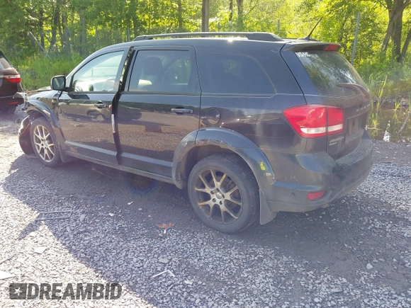 2013 Dodge Journey R/T with VIN 3C4PDDEG4DT691056, listed as a IAAI auction lot 42535196 with 198,307 mi miles and . Bid and sale history available at DreamBid. Image 3.