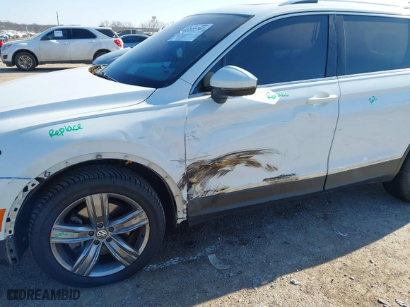 2019 Volkswagen Tiguan SEL Premium with VIN 3VV4B7AX0KM007788, listed as a IAAI auction lot 41227707 with 67,859 mi miles. Bid and sale history available at carsss.com. Image 6.