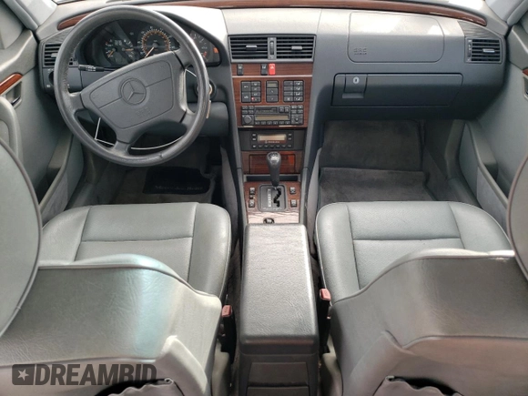 1995 Mercedes-Benz C with VIN WDBHA28E1SF151911, listed as a Copart auction lot 76814424 with 128,184 mi miles and Clean Title. Bid and sale history available at carsss.com. Image 8.