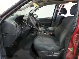 2002 Jeep Grand Cherokee Laredo with VIN 1J4GW48S22C164159, listed as a Copart auction lot 89146265 with 135,087 mi miles and Salvage Title. Bid and sale history available at carsss.com. Image 7.