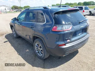 2020 Jeep Cherokee Altitude with VIN 1C4PJMLX7LD636746, listed as a IAAI auction lot 42271942 with 54,435 mi miles and . Bid and sale history available at DreamBid. Image 3.