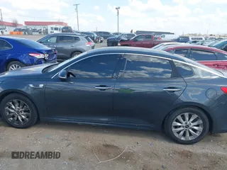 2016 Kia Optima EX with VIN 5XXGU4L30GG014019, listed as a IAAI auction lot 41786540 with 112,894 mi miles and . Bid and sale history available at carsss.com. Image 14.