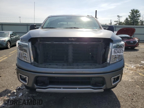 2018 Nissan Titan SV with VIN 1N6AA1E50JN514802, listed as a Copart auction lot 62342875 with 101,593 mi miles and Salvage title. Bid and sale history available at DreamBid. Image 5.