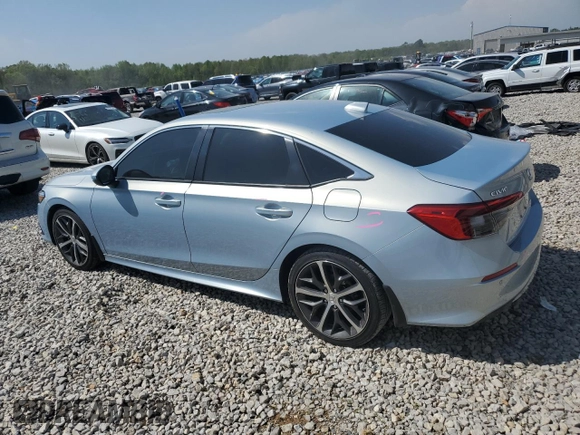 2023 Honda Civic Touring z VIN 2HGFE1F94PH310134, wystawiony jako Copart lot #52311085 z przebiegiem 32 682 mil mil oraz Szkoda całkowita • Salvage title. Historia ofert i sprzedaży dostępna na DreamBid. Obrazek 2.