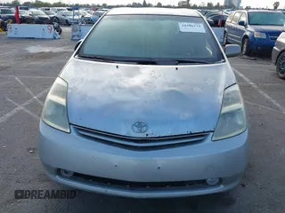 2005 Toyota Prius z VIN JTDKB20U353071619, wystawiony jako IAAI lot #42386134 z przebiegiem Nie podano mil oraz . Historia ofert i sprzedaży dostępna na DreamBid. Obrazek 6.