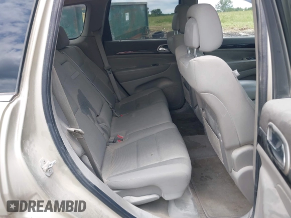 2011 Jeep Grand Cherokee Laredo with VIN 1J4RR4GG8BC558018, listed as a IAAI auction lot 42347367 with 180,334 mi miles and . Bid and sale history available at DreamBid. Image 8.