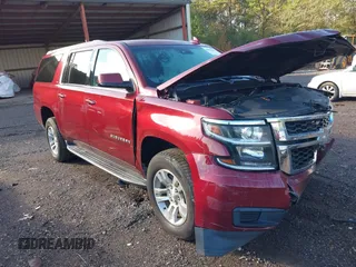 2017 Chevrolet Suburban LT with VIN 1GNSKHKC3HR311901, listed as a IAAI auction lot 40883429 with 141,325 mi miles. Bid and sale history available at carsss.com. Image 1.
