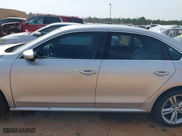 2012 Volkswagen Passat TDI SEL Premium with VIN 1VWCN7A31CC080506, listed as a IAAI auction lot 41792115 with 228,710 mi miles. Bid and sale history available at carsss.com. Image 14.