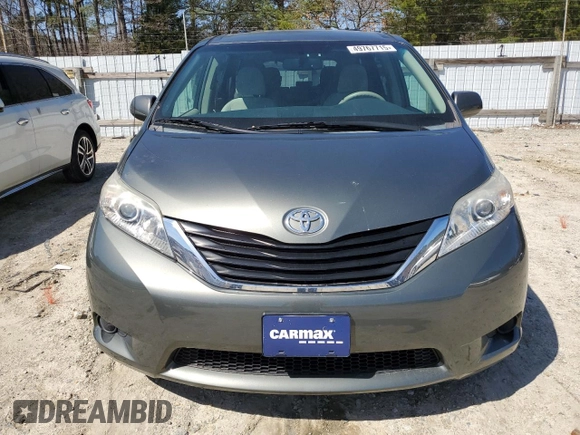2012 Toyota Sienna LE AAS with VIN 5TDKK3DC0CS274812, listed as a Copart auction lot 49767715 with 124,699 mi miles and Salvage Title. Bid and sale history available at carsss.com. Image 5.