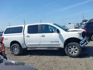 2005 Nissan Titan LE with VIN 1N6AA07B65N506688, listed as a IAAI auction lot 42086502 with 245,661 mi miles and . Bid and sale history available at DreamBid. Image 13.