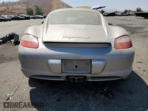 2006 Porsche Cayman S с VIN WP0AB298X6U784563, выставлен на аукционе Copart как лот 69819084 с пробегом 132 131 миль миль и Списание • Salvage title. История ставок и продаж доступна на DreamBid. Изображение 6.
