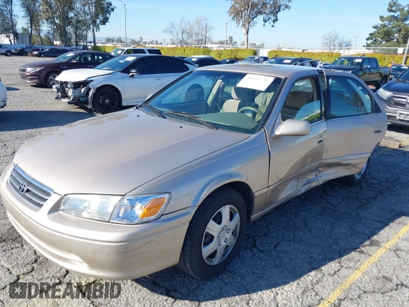 2001 Toyota Camry CE with VIN JT2BG22KX10559757, listed as a IAAI auction lot 41823719 with 72,775 mi miles. Bid and sale history available at carsss.com. Image 2.