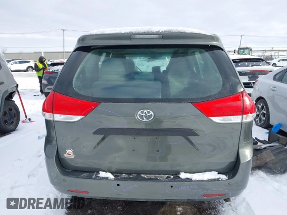 2014 Toyota Sienna L with VIN 5TDZK3DC2ES429684, listed as a IAAI auction lot 41529309 with 112,190 mi miles. Bid and sale history available at carsss.com. Image 16.