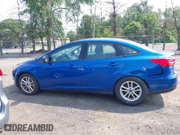 2018 Ford Focus SE z VIN 1FADP3FE1JL254632, wystawiony jako IAAI lot #42408683 z przebiegiem 74 696 mil mil oraz . Historia ofert i sprzedaży dostępna na DreamBid. Obrazek 14.