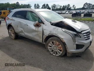 2019 Cadillac XT5 Premium Luxury FWD with VIN 1GYKNERS2KZ231485, listed as a Copart auction lot 61370045 with 79,817 mi miles and Salvage title. Bid and sale history available at DreamBid. Image 4.