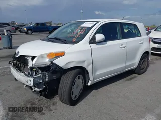 2010 Scion xD with VIN JTKKU4B48AJ053828, listed as a IAAI auction lot 41959804 with 255,337 mi miles. Bid and sale history available at carsss.com. Image 2.