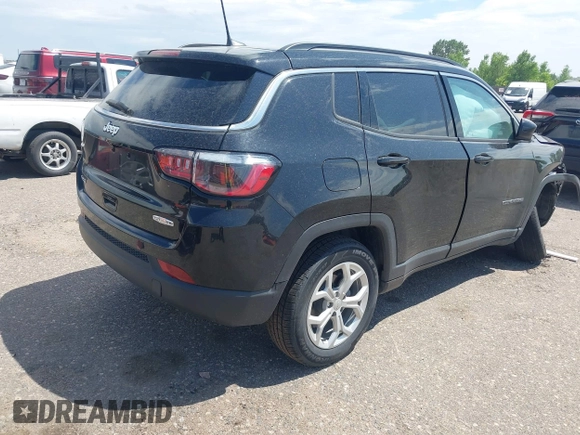 2024 Jeep Compass Latitude with VIN 3C4NJDBN4RT100797, listed as a IAAI auction lot 42572805 with 26,508 mi miles and . Bid and sale history available at DreamBid. Image 4.