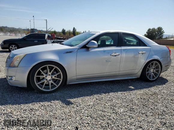 2010 Cadillac CTS Premium with VIN 1G6DP5EV9A0104893, listed as a Copart auction lot 52033645 with 197,118 mi miles and Salvage title. Bid and sale history available at DreamBid. Image 1.