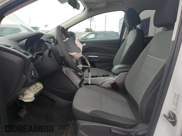 2013 Ford Escape SE with VIN 1FMCU0GX3DUB86597, listed as a Copart auction lot 59513935 with 94,293 mi miles and Salvage title. Bid and sale history available at DreamBid. Image 7.