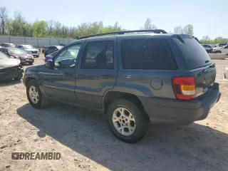 2003 Jeep Grand Cherokee Laredo with VIN 1J4GX48S83C504543, listed as a Copart auction lot 52723835 with 220,574 mi miles and Clean Title. Bid and sale history available at carsss.com. Image 2.