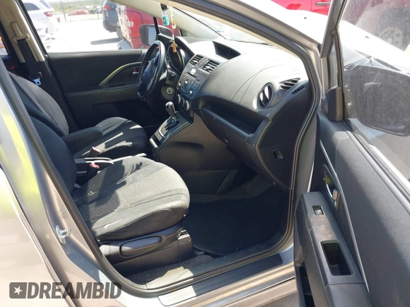 2012 Mazda 5 Touring with VIN JM1CW2CL9C0128075, listed as a IAAI auction lot 41886362 with 139,262 mi miles and . Bid and sale history available at carsss.com. Image 5.