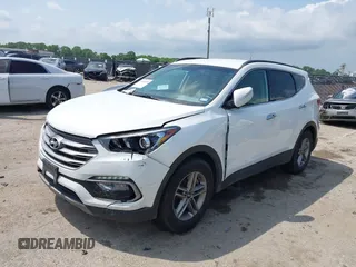 2018 Hyundai Santa Fe 2.4L z VIN 5NMZUDLB3JH055771, wystawiony jako IAAI lot #42126058 z przebiegiem 142 991 mil mil oraz . Historia ofert i sprzedaży dostępna na DreamBid. Obrazek 17.