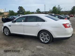 2010 Ford Taurus Limited with VIN 1FAHP2FW4AG144445, listed as a Copart auction lot 56878295 with 148,439 mi miles and Salvage title. Bid and sale history available at DreamBid. Image 2.