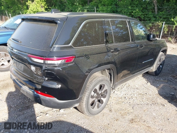 2023 Jeep Grand Cherokee with VIN 1C4RJYB68PC648859, listed as a IAAI auction lot 42267180 with 29,809 mi miles and . Bid and sale history available at DreamBid. Image 4.