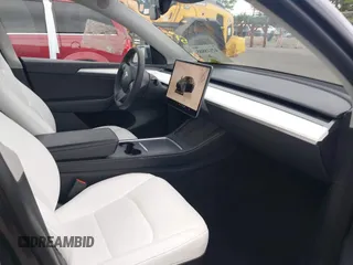 2022 Tesla Model Y Performance z VIN 7SAYGDEF5NF544542, wystawiony jako IAAI lot #42118855 z przebiegiem 27 256 mil mil oraz . Historia ofert i sprzedaży dostępna na DreamBid. Obrazek 5.