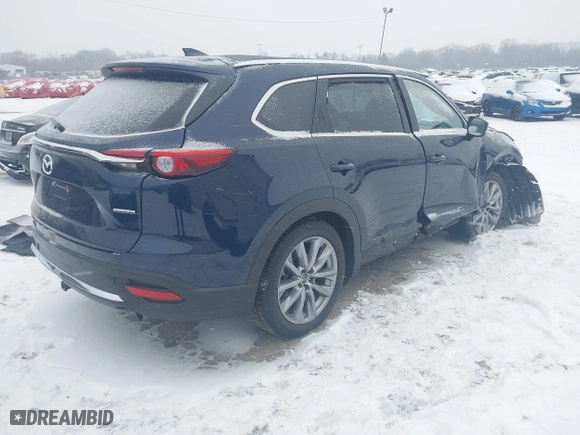 2021 Mazda CX-9 Grand Touring with VIN JM3TCBDY1M0519457, listed as a IAAI auction lot 41301146 with 22,087 mi miles. Bid and sale history available at carsss.com. Image 4.
