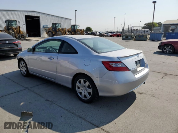 2010 Honda Civic Cpe LX with VIN 2HGFG1B6XAH523795, listed as a Copart auction lot 64898464 with 28,863 mi miles and Salvage Title. Bid and sale history available at carsss.com. Image 2.