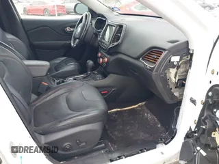 2019 Jeep Cherokee Trailhawk with VIN 1C4PJMBN6KD124023, listed as a IAAI auction lot 41432217 with 76,934 mi miles and . Bid and sale history available at DreamBid. Image 5.