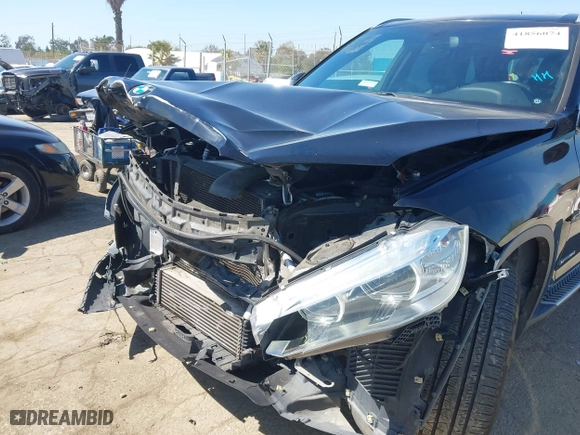 2017 BMW X5 sDrive35i with VIN 5UXKR2C5XH0U17833, listed as a IAAI auction lot 41856074 with 115,666 mi miles. Bid and sale history available at carsss.com. Image 6.