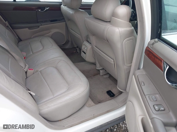 2005 Cadillac DeVille with VIN 1G6KD54Y75U162964, listed as a IAAI auction lot 40794096 with 165,341 mi miles. Bid and sale history available at carsss.com. Image 8.